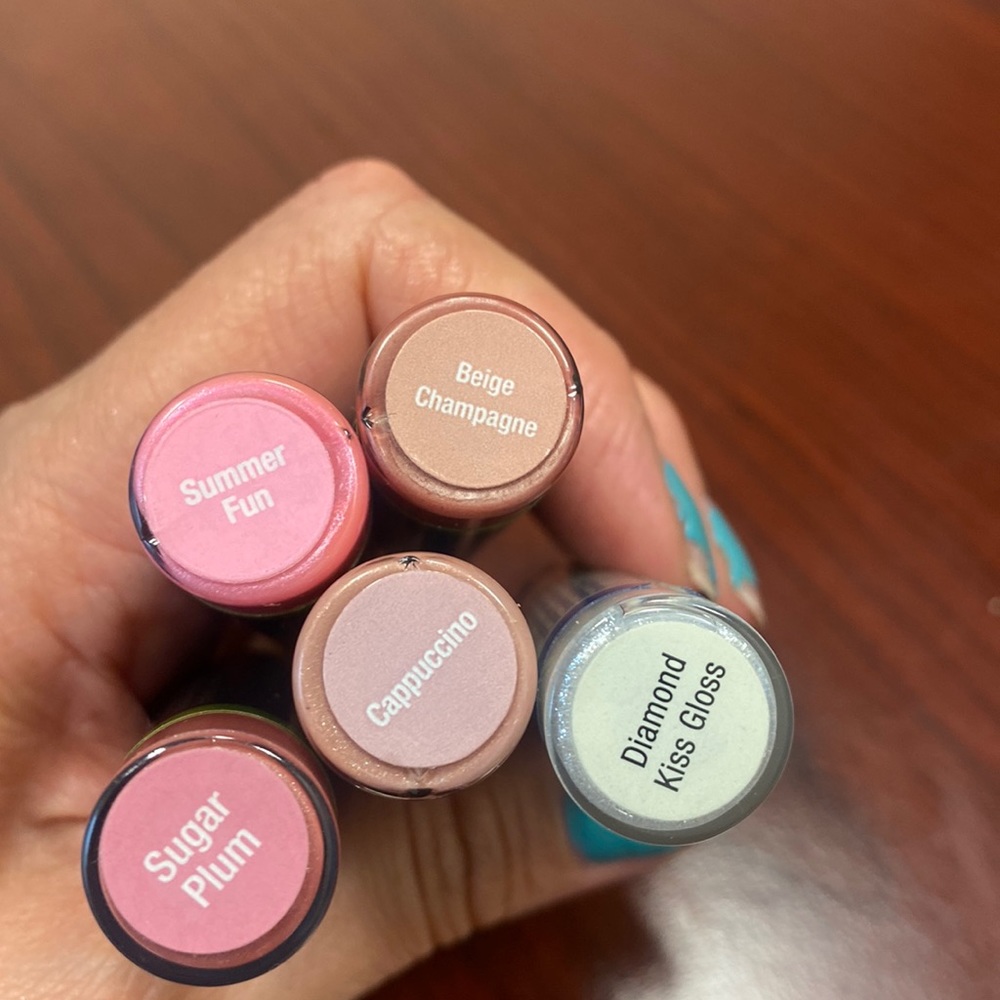 Brand new lipsense, gloss, and bag.